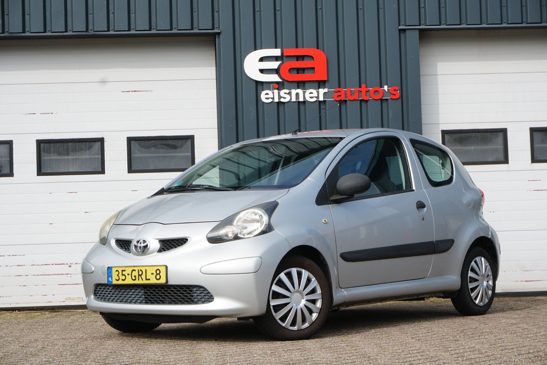 Toyota Aygo 1.0-12V | AIRCO | APK 12-08-2027 | NL AUTO N.A.P, Auto's, Voorwielaandrijving, Stof, Gebruikt, Zwart