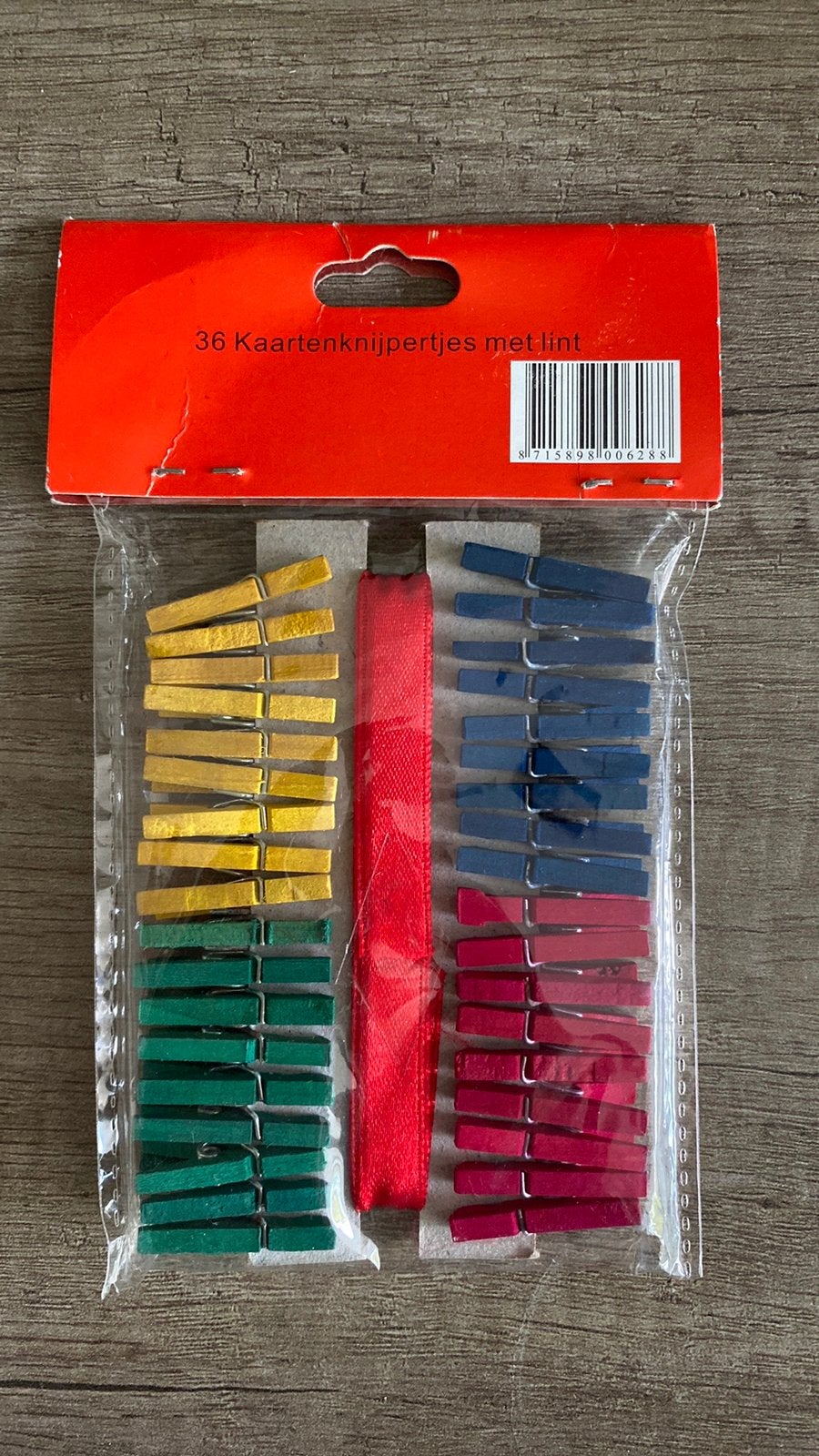 Knijpertjes met rood lint, Ophalen of Verzenden, Zo goed als nieuw