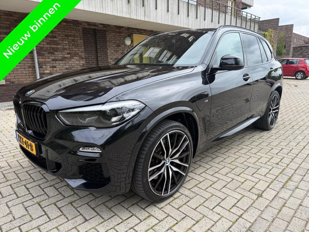BMW X5 xDrive45e Executive Dealer Onderhouden (bj 2020), Auto's, Gebruikt, Zwart, Vierwielaandrijving, Hybride Elektrisch/Benzine
