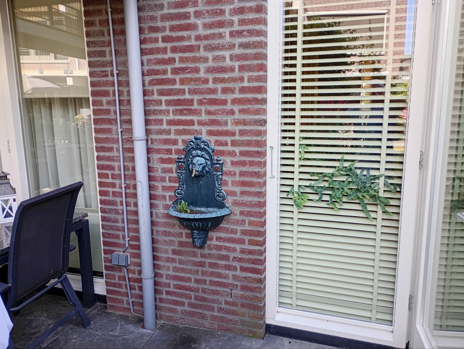 Antieke gietijzeren wandfontein met leeuwenkop, Tuin en Terras, Ophalen of Verzenden, Gebruikt, Gietijzer, Fontein