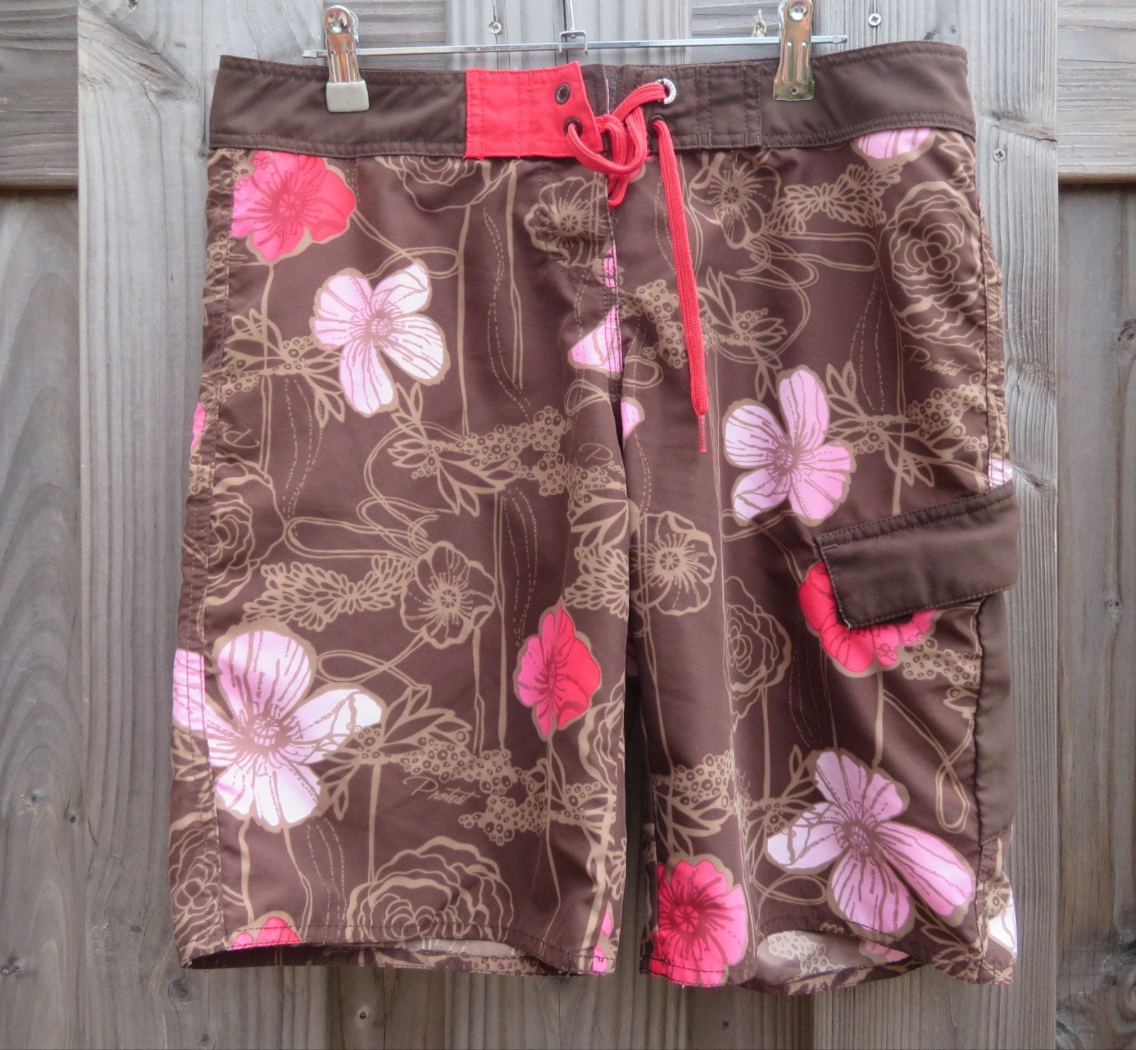 Protest dames zwemshort S - Bruin met roze bloemenprint, Kleding | Dames, Overige kleuren, Ophalen of Verzenden, Zo goed als nieuw