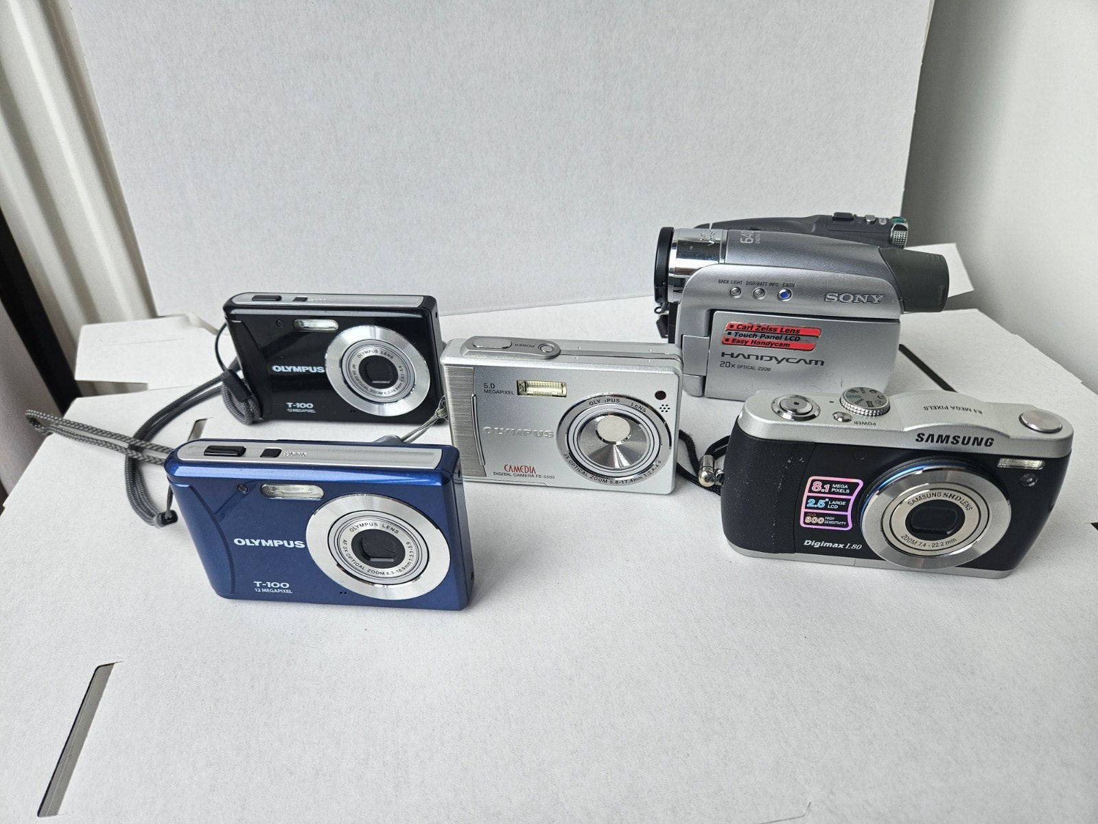 Kavel: 4 digitale camera's & 1 videocamera, Ophalen of Verzenden, Gebruikt, Compactcamera, Overige Merken