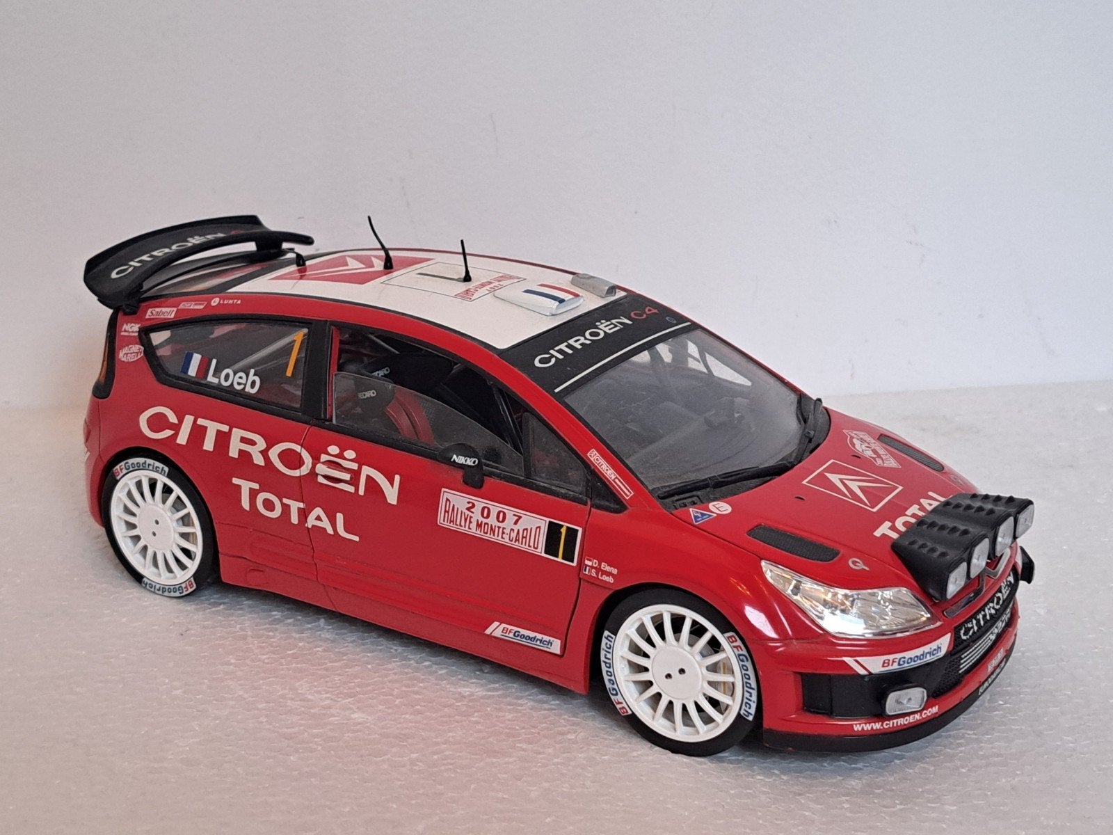 Citroen C4 WRC Rally Monte Carlo 2007 Night Loeb 1/18 Solido, Ophalen of Verzenden, Gebruikt, Auto, Solido
