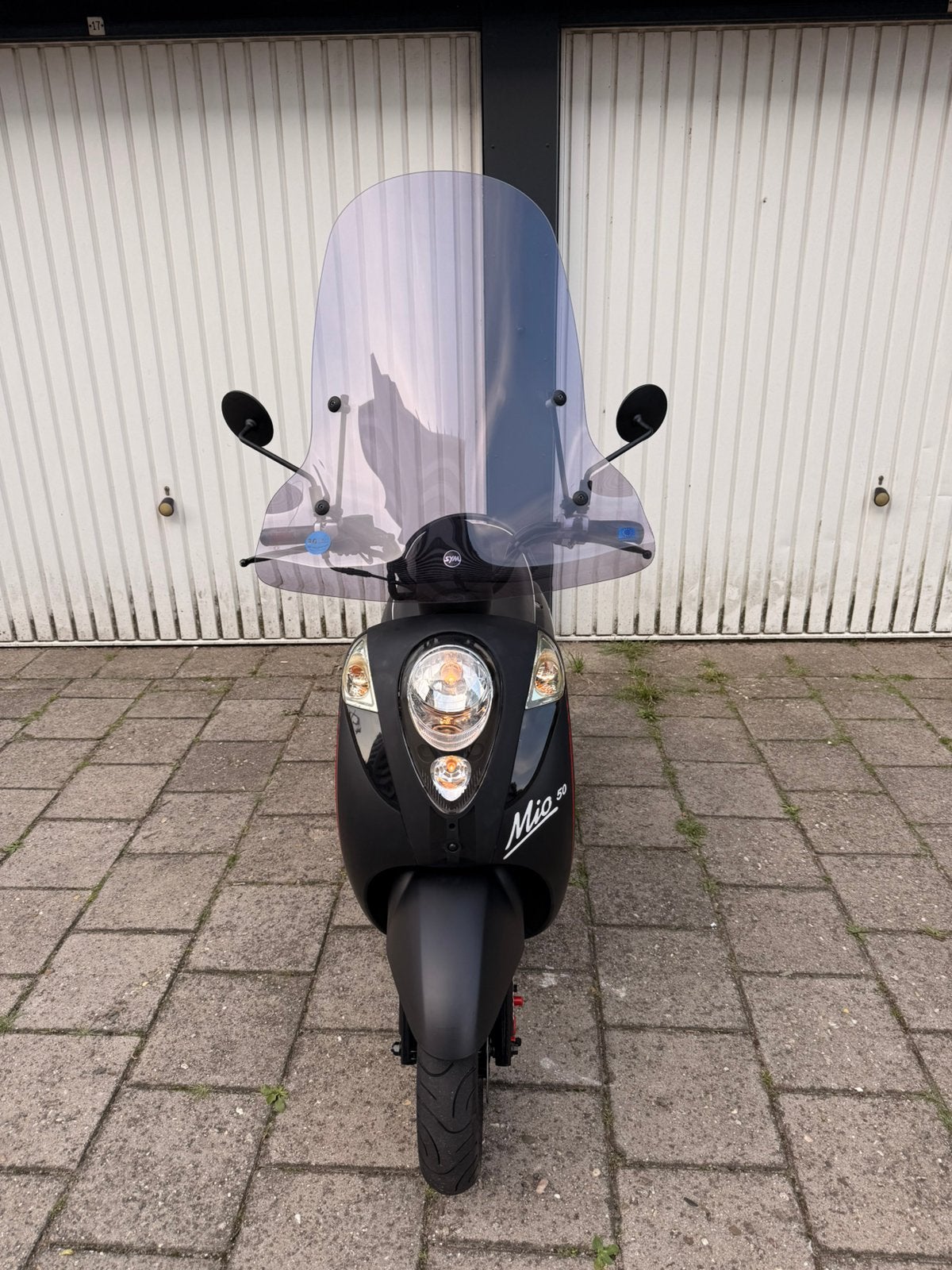 Sym Mio 50 cc Mat zwart 2017.!!!, Fietsen en Brommers, Scooters | SYM, Zo goed als nieuw, Benzine, 50 cc, Maximaal 25 km/u
