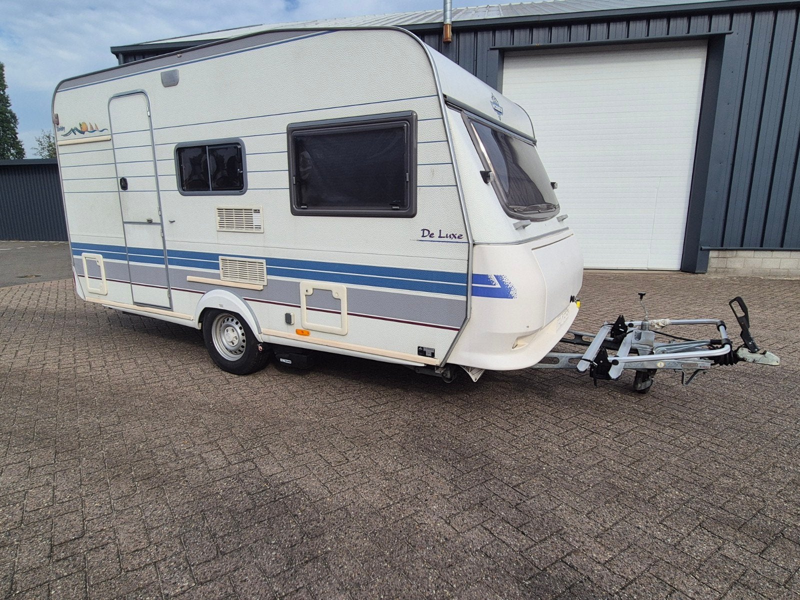 Hobby De Luxe caravan met mover, voortent en airco, Caravans en Kamperen, Hobby, Airco, Treinzit, Dwarsbed