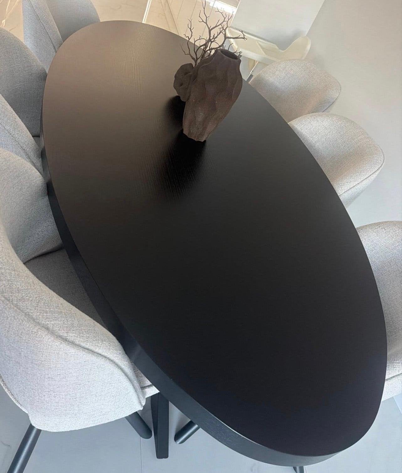 Ovale eettafel met zwart blad(mango hout), 100 tot 150 cm, Ophalen of Verzenden, Zo goed als nieuw, 150 tot 200 cm