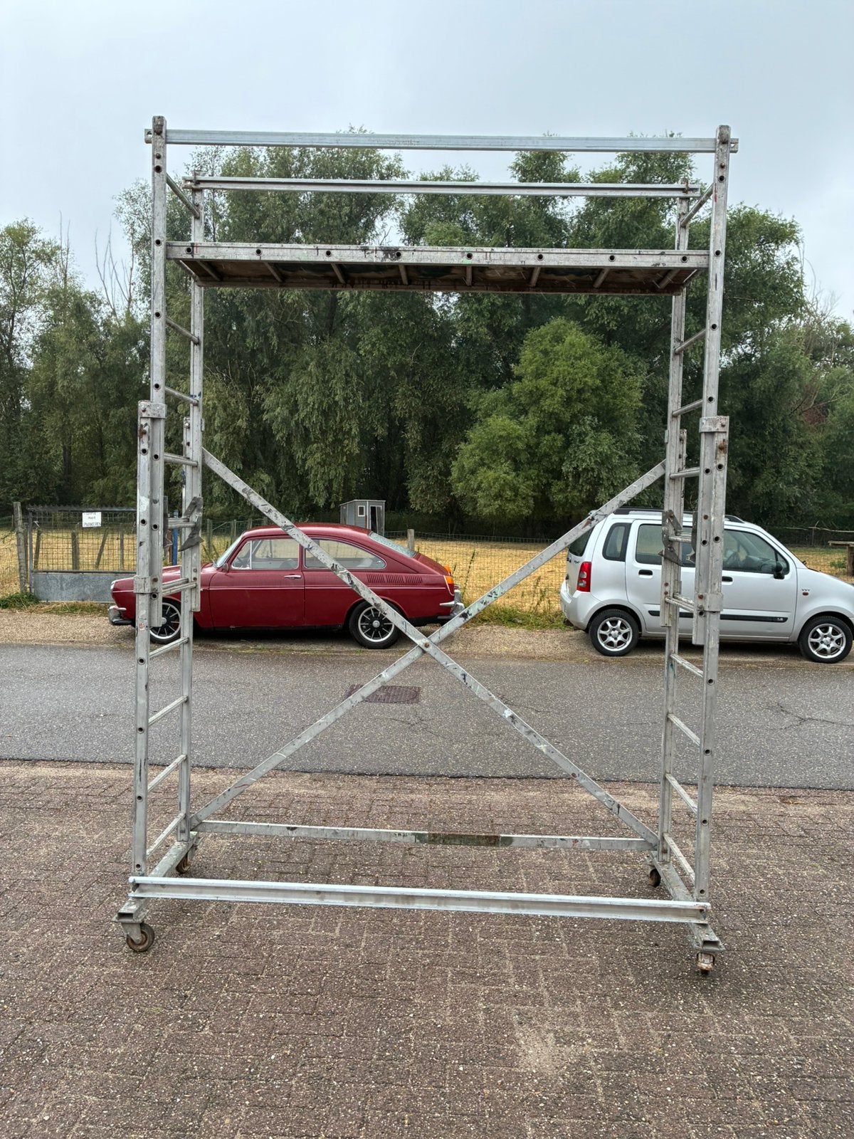 Schuifsteiger te koop met een werkhoogte van 4 meter., Ophalen, Gebruikt, Rolsteiger of Kamersteiger, 2 tot 5 meter