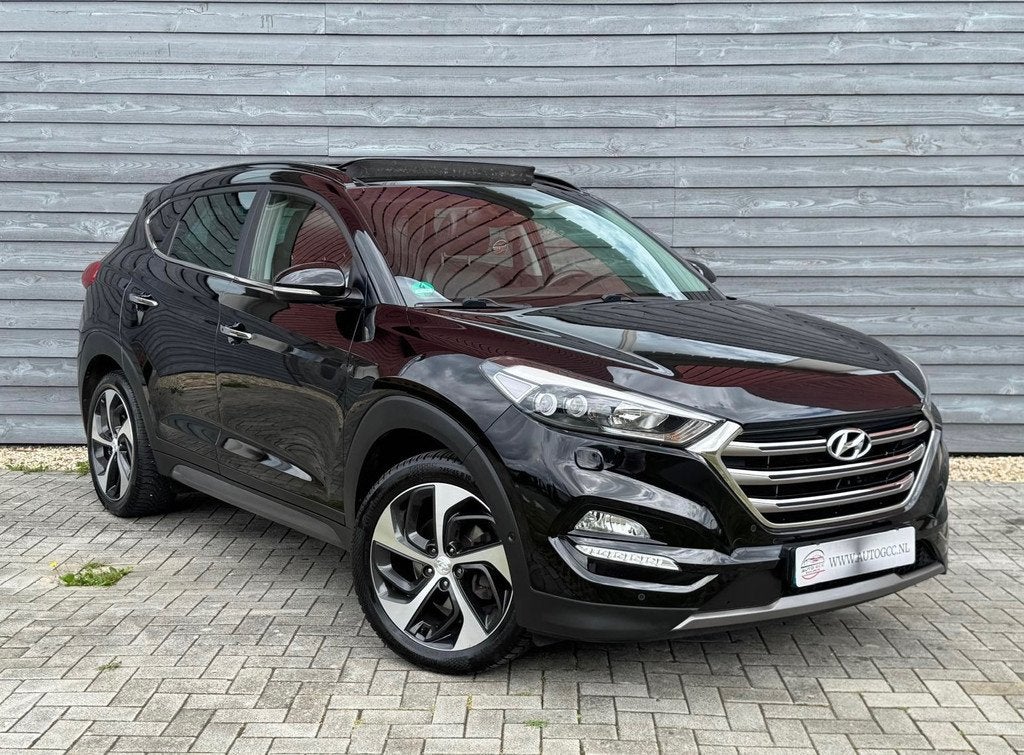 Hyundai Tucson 1.6 T-GDi PREMIUIM 4WD PANO NAVI LEDER VOL OP, Auto's, Hyundai, Gebruikt, 4 cilinders, Zwart, Leder
