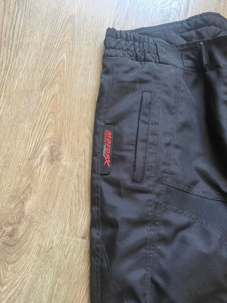 Motor X- regenbroek maat M zo goed als nieuw, Motoren, Ophalen of Verzenden, Tweedehands, Heren, Broek | textiel