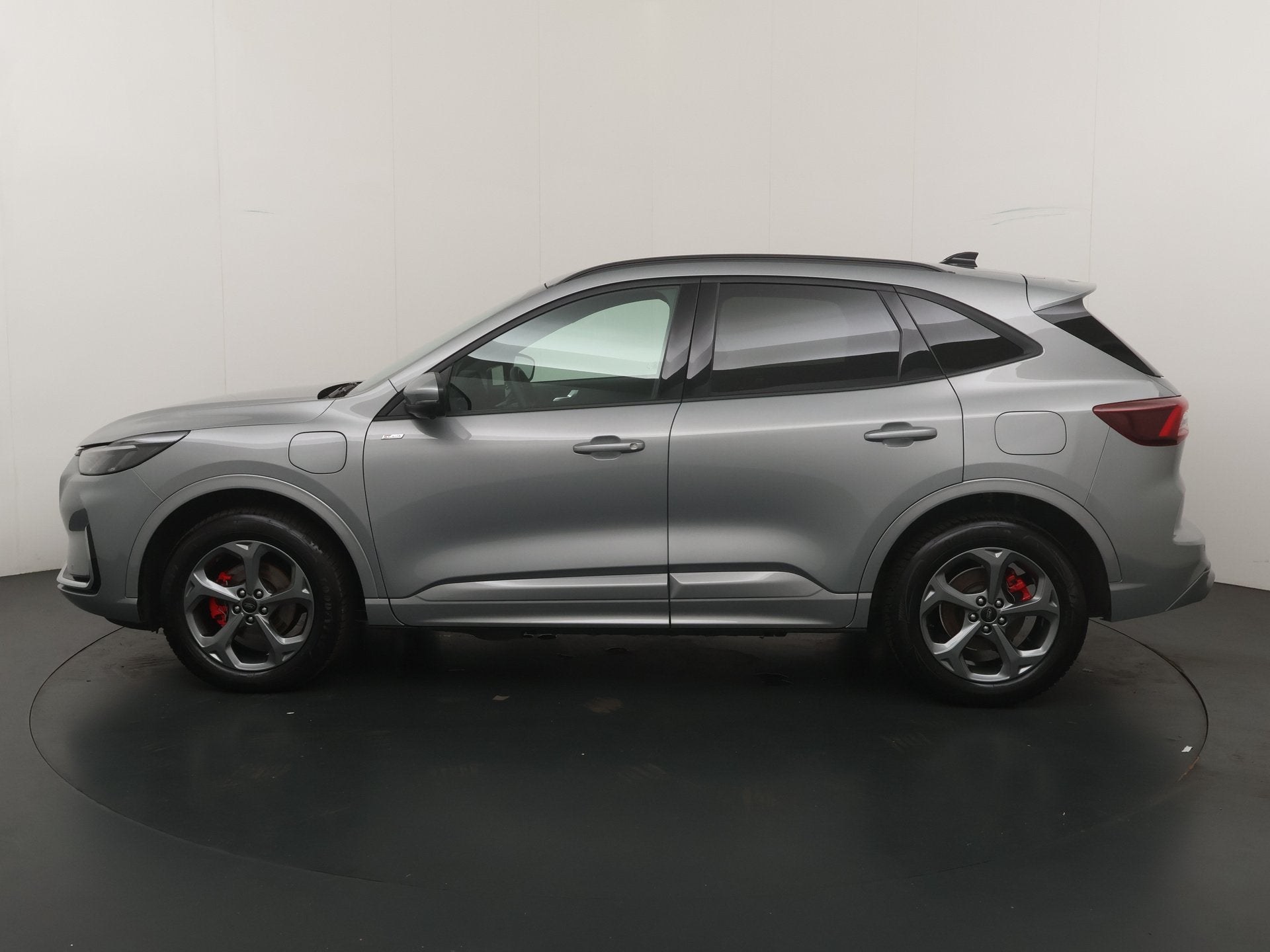 Ford Kuga 2.5 PHEV 243 pk ST-Line X I AGR stoelen | Adapt Cr, Auto's, Ford, 12 maanden, 14 kWh, Gebruikt, Zwart