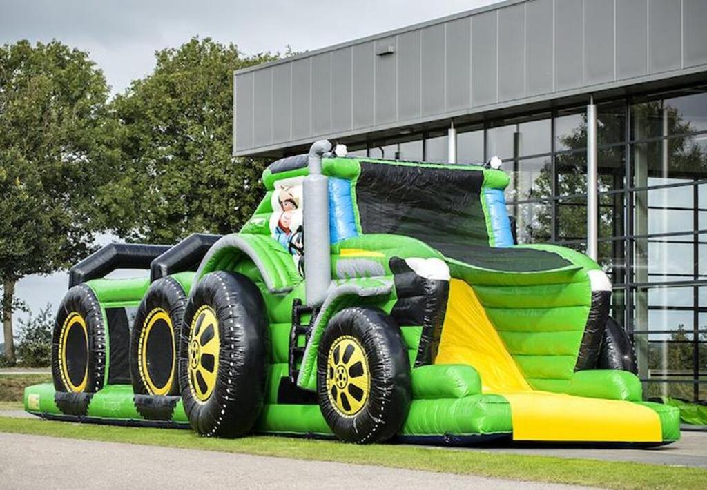 Opblaasbare Tractor Stormbaan - te huur!, Verzenden, Gebruikt