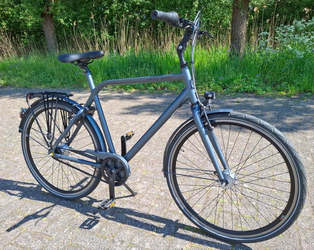 Cortina Mozzo herenfiets met beltdrive, riemaandrijving ✅️, Ophalen, Versnellingen, Zo goed als nieuw, 57 tot 61 cm