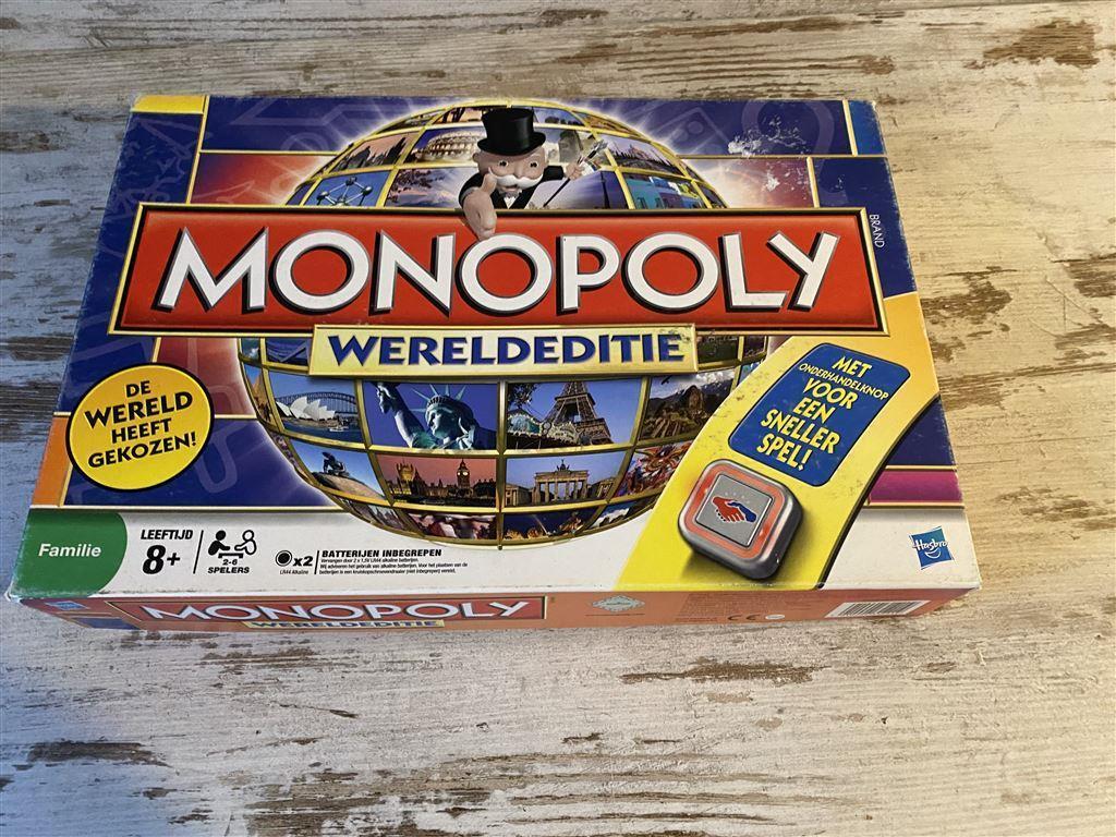 Monopoly wereldeditie met onderhandelknop [s90], Hobby en Vrije tijd, Gezelschapsspellen | Bordspellen, Verzenden, Zo goed als nieuw