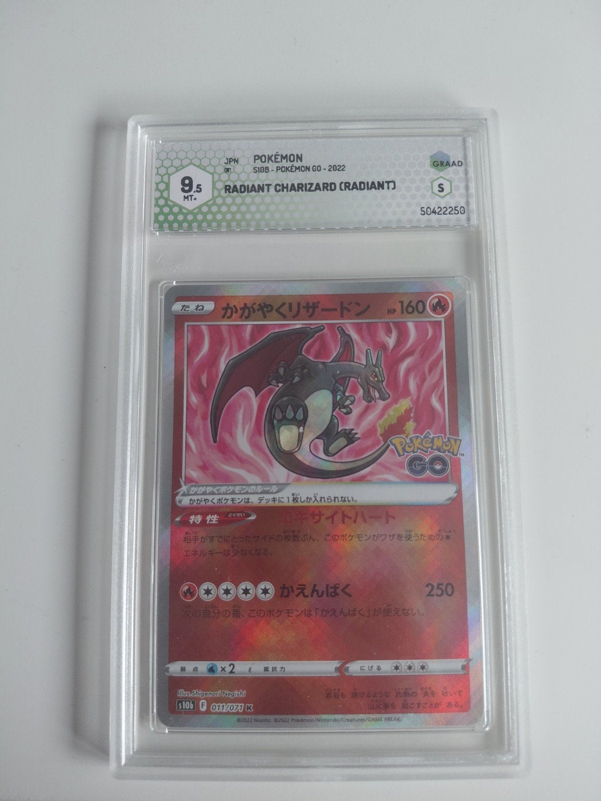 radiant charizard graad 9.5 mint, Ophalen of Verzenden, Zo goed als nieuw