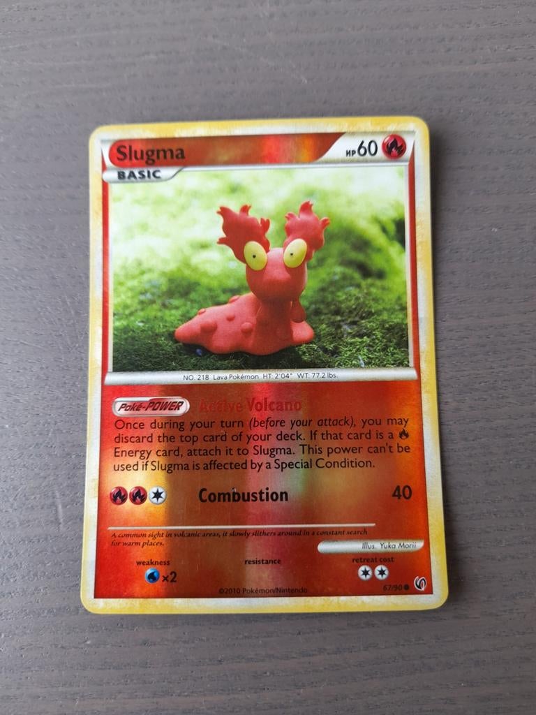 Undaunted 67/90 slugma reverse, Ophalen of Verzenden, Gebruikt, Losse kaart, Foil