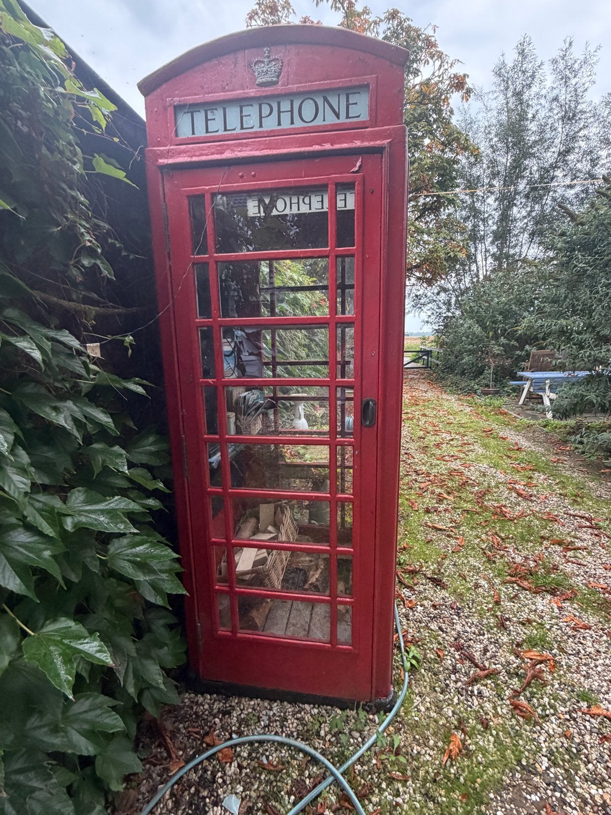 Originele Engelse telefooncel van gietijzer, Ophalen