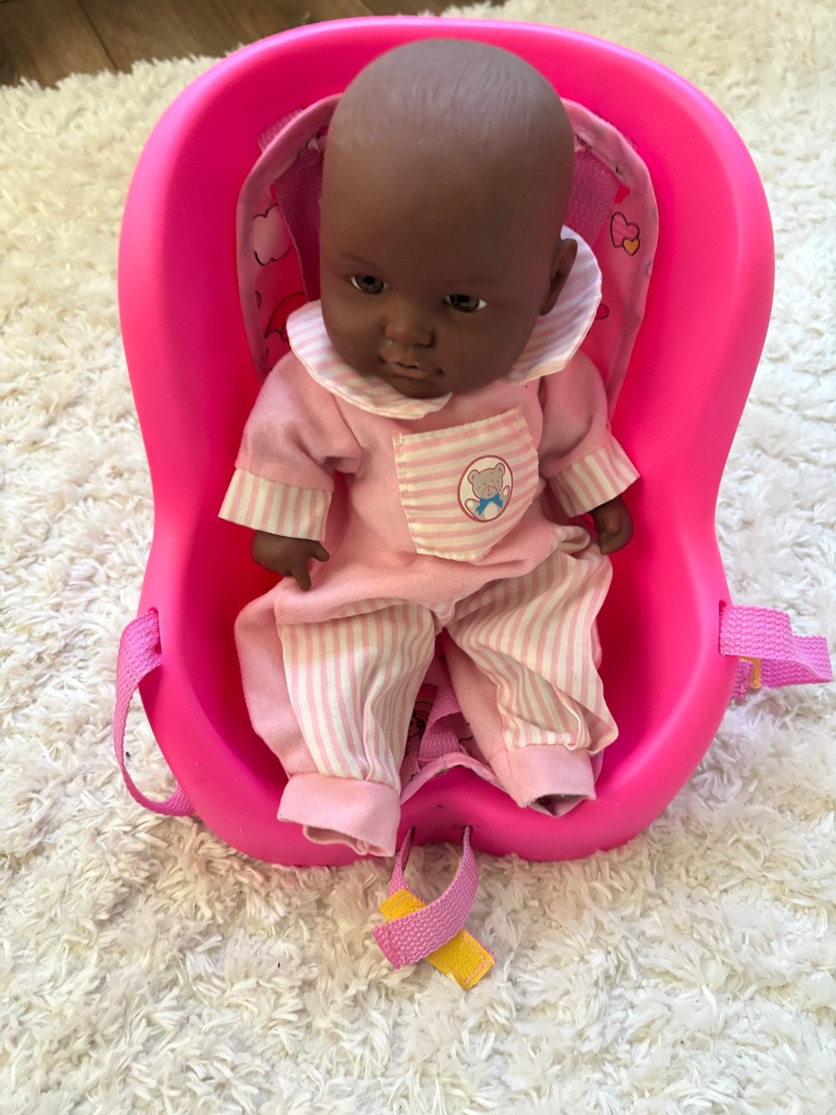 Babypop met roze fietsstoeltje, Kinderen en Baby's, Speelgoed | Poppen, Ophalen of Verzenden, Gebruikt, Babypop