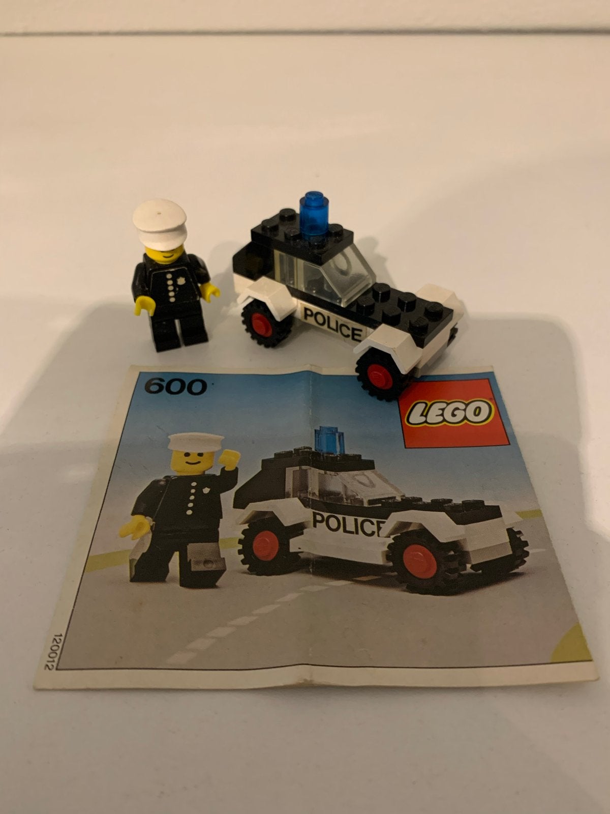Lego City Politieauto 600 met minifiguur en instructies