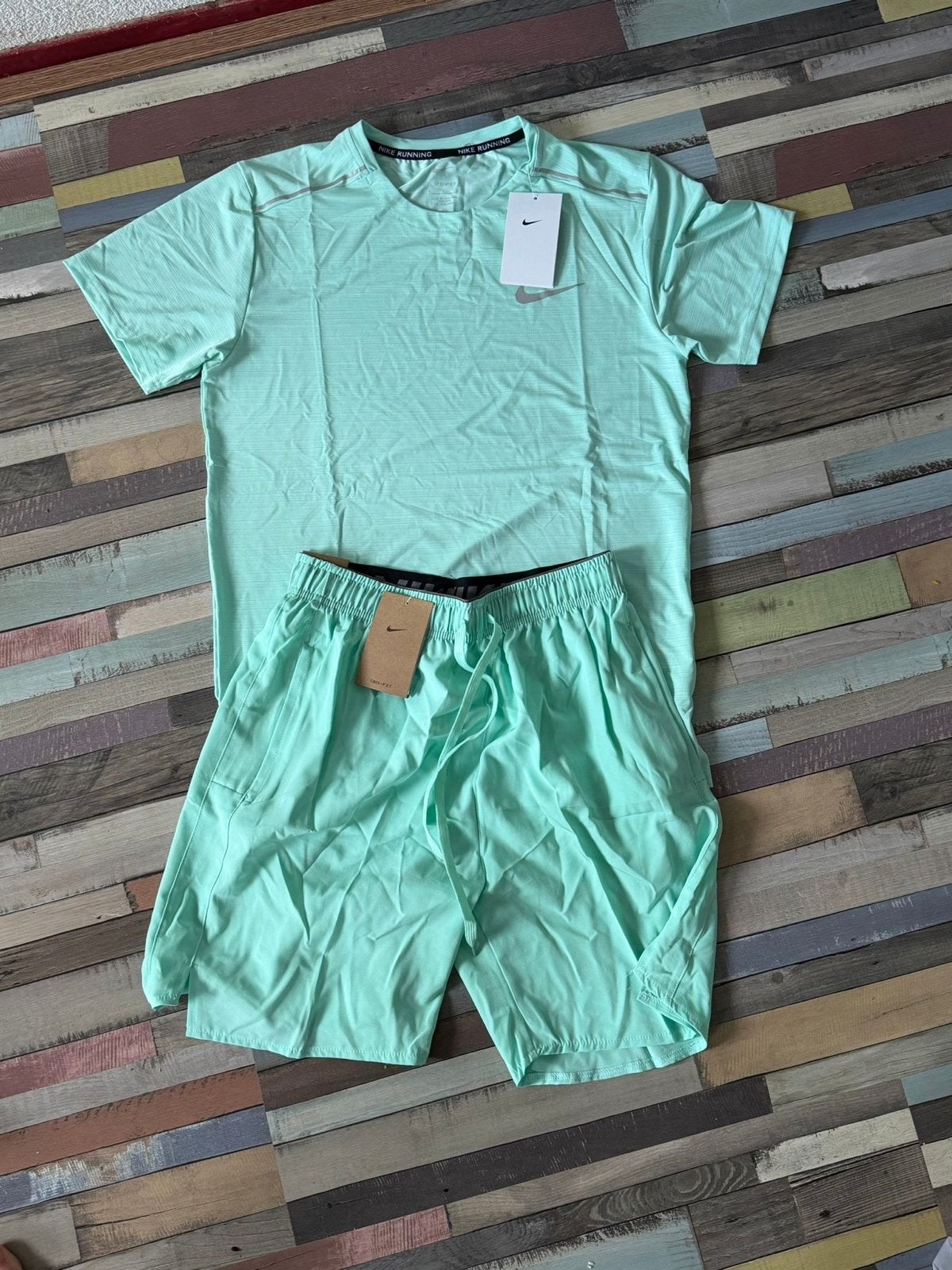 Nike Miller hardloopset (shirt en korte broek), Ophalen, Maat 52/54 (L), Nieuw, Hardlopen of Fietsen