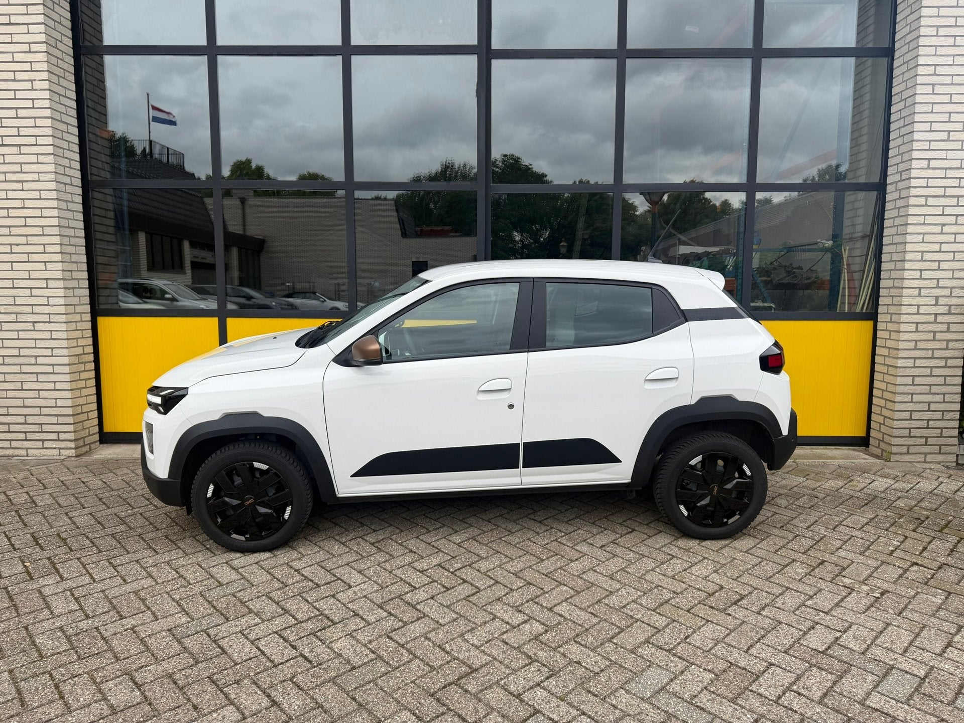 Dacia Spring Extreme 65 26.8 kWh Full Option!, Auto's, Dacia, Stof, Gebruikt, 38 min, 4 stoelen