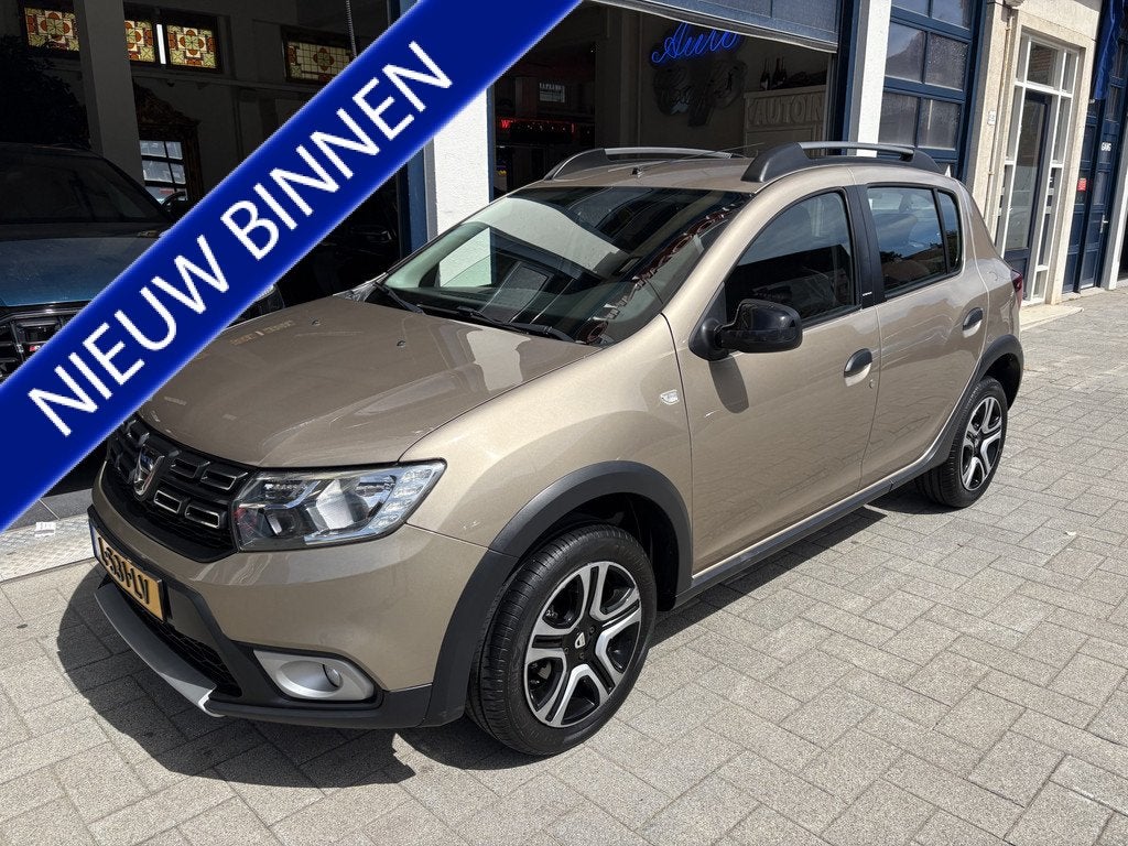 Dacia Sandero 0.9 TCe SL Stepway AIRCO/NAVI/BLUETOOTH/CRUISE, Auto's, Dacia, Voorwielaandrijving, 898 cc, Euro 6, Bruin