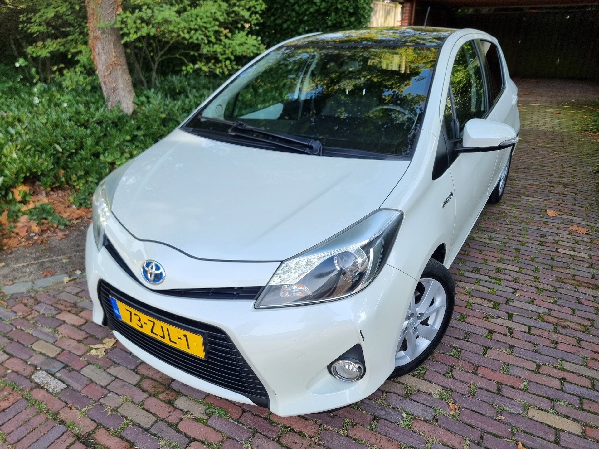 Toyota Yaris 1.5 Full Hybrid Dynamic Pano/Navi/Half leder, Auto's, Toyota, Euro 5, 1497 cc, Gebruikt, 4 cilinders