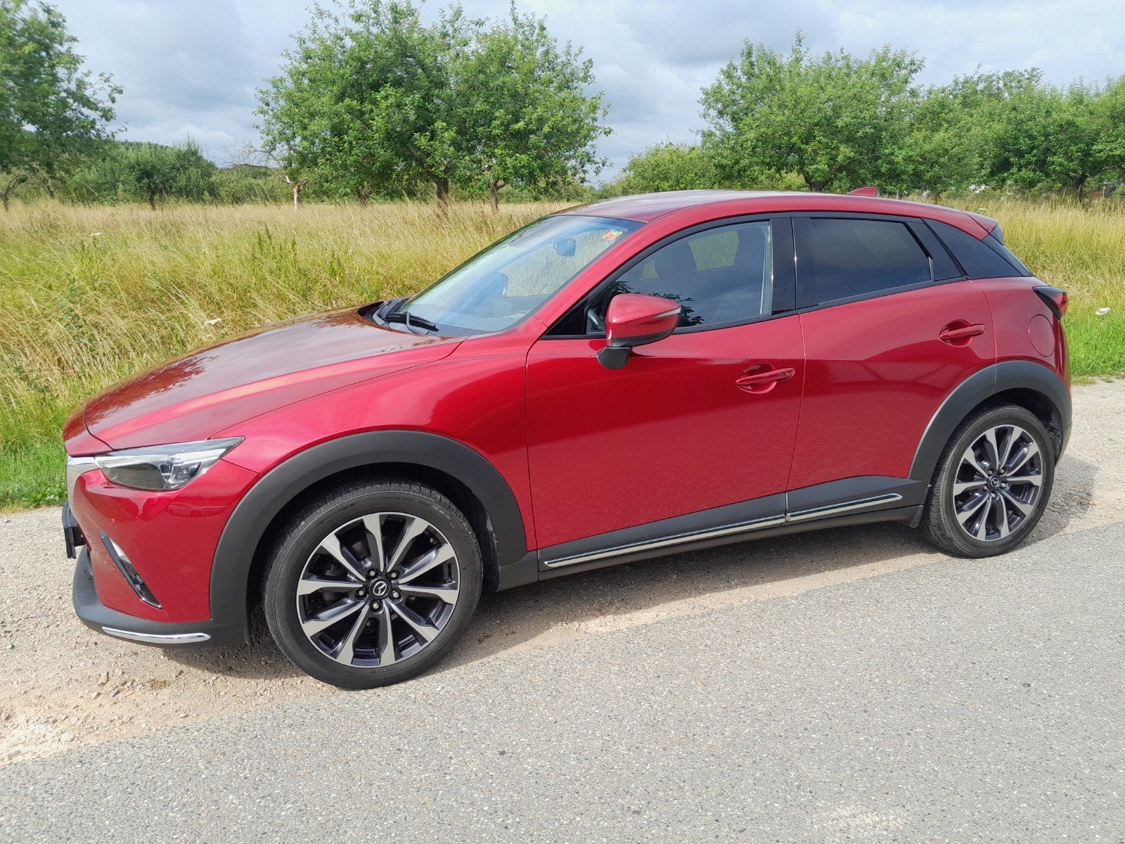 Mazda CX-3 2.0 gt-m Skyactiv-g 120pk 2019 Rood, Auto's, 1998 cc, 15 km/l, 625 kg, Zwart