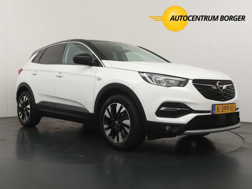 Opel Grandland X 1.2 Turbo Automaat Elegance Navi/18"LM /Cru, Auto's, Gebruikt, 1199 cc, Met garantie (alle), Leder en Stof