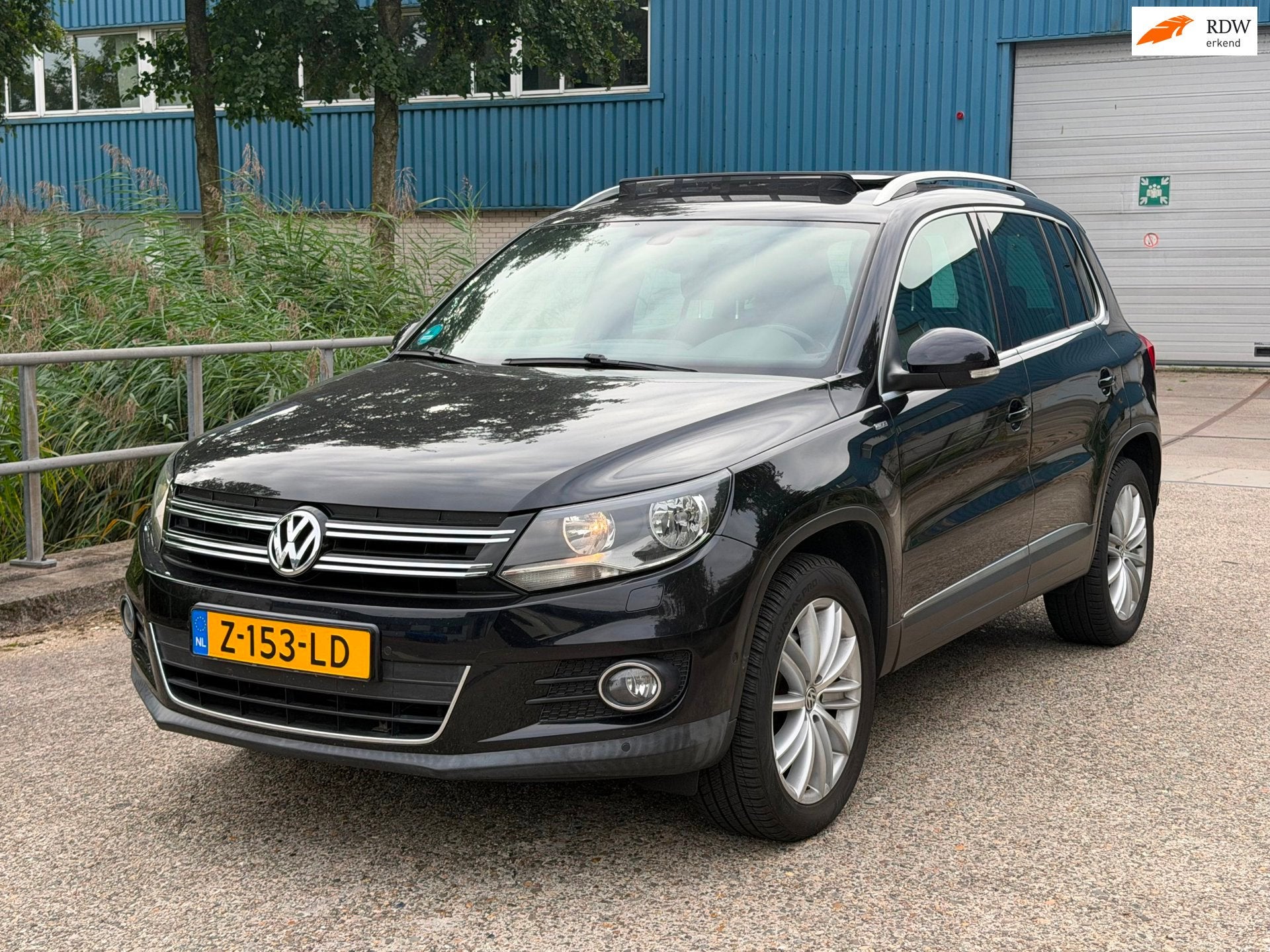 Volkswagen Tiguan 1.4 TSI Comfort&Design Facelift! PANO! NAV, Euro 5, 15 km/l, 4 cilinders, Zwart