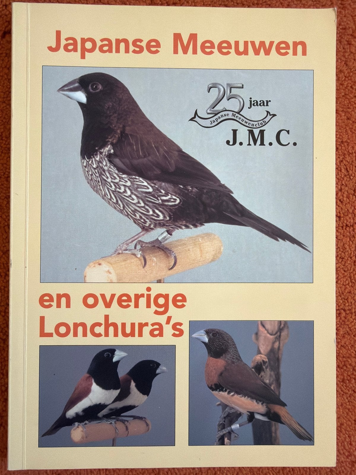 Japanse Meeuwen en overige Lonchura's - JMC Jubileumboek, Ophalen of Verzenden, Zo goed als nieuw, Vogels