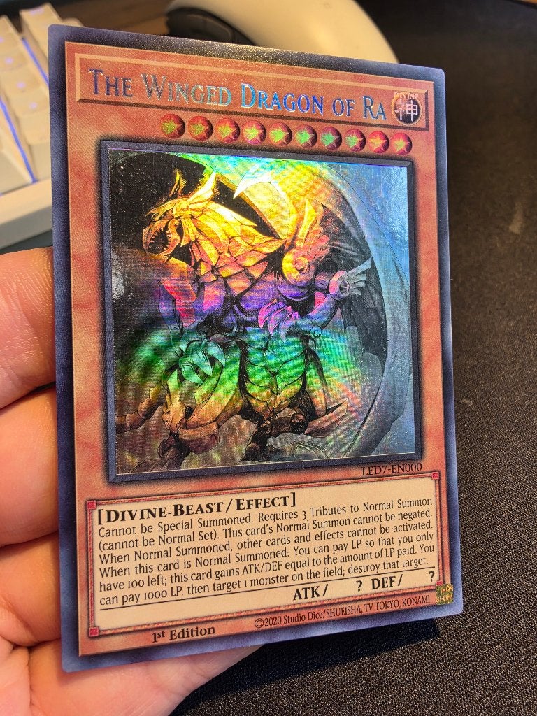 The Winged Dragon of Ra (LED7-EN000, Ghost Rare), Ophalen of Verzenden, Zo goed als nieuw, Losse kaart, Foil