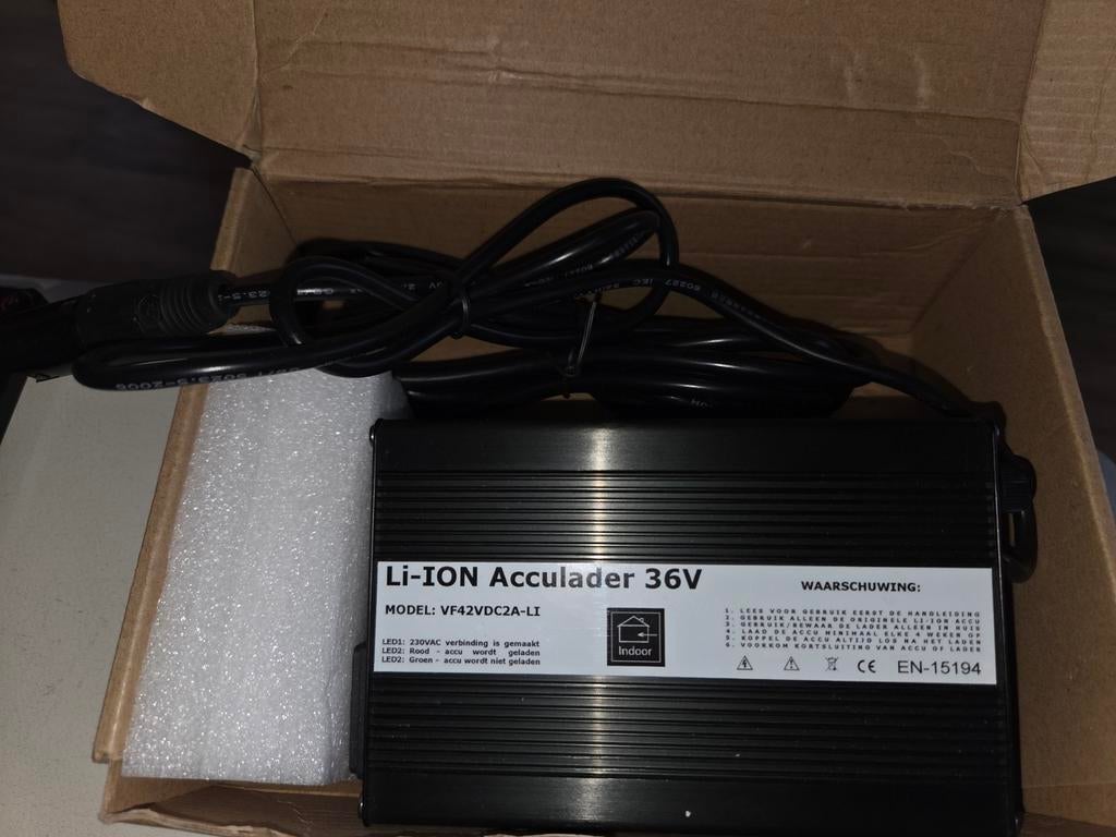 Li-ION Acculader 36V - Nieuw in doos, Ophalen of Verzenden, Nieuw