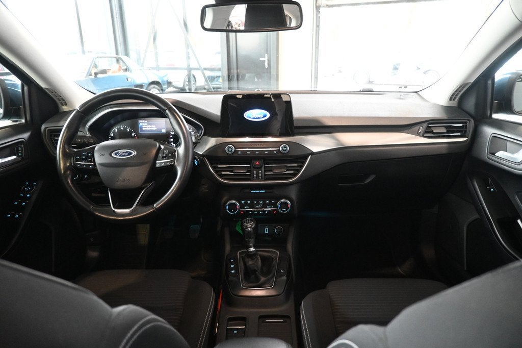 Ford Focus 1.0 EcoBoost Titanium Business Clima Navigatie St, Stof, Gebruikt, Met garantie (alle), Blauw
