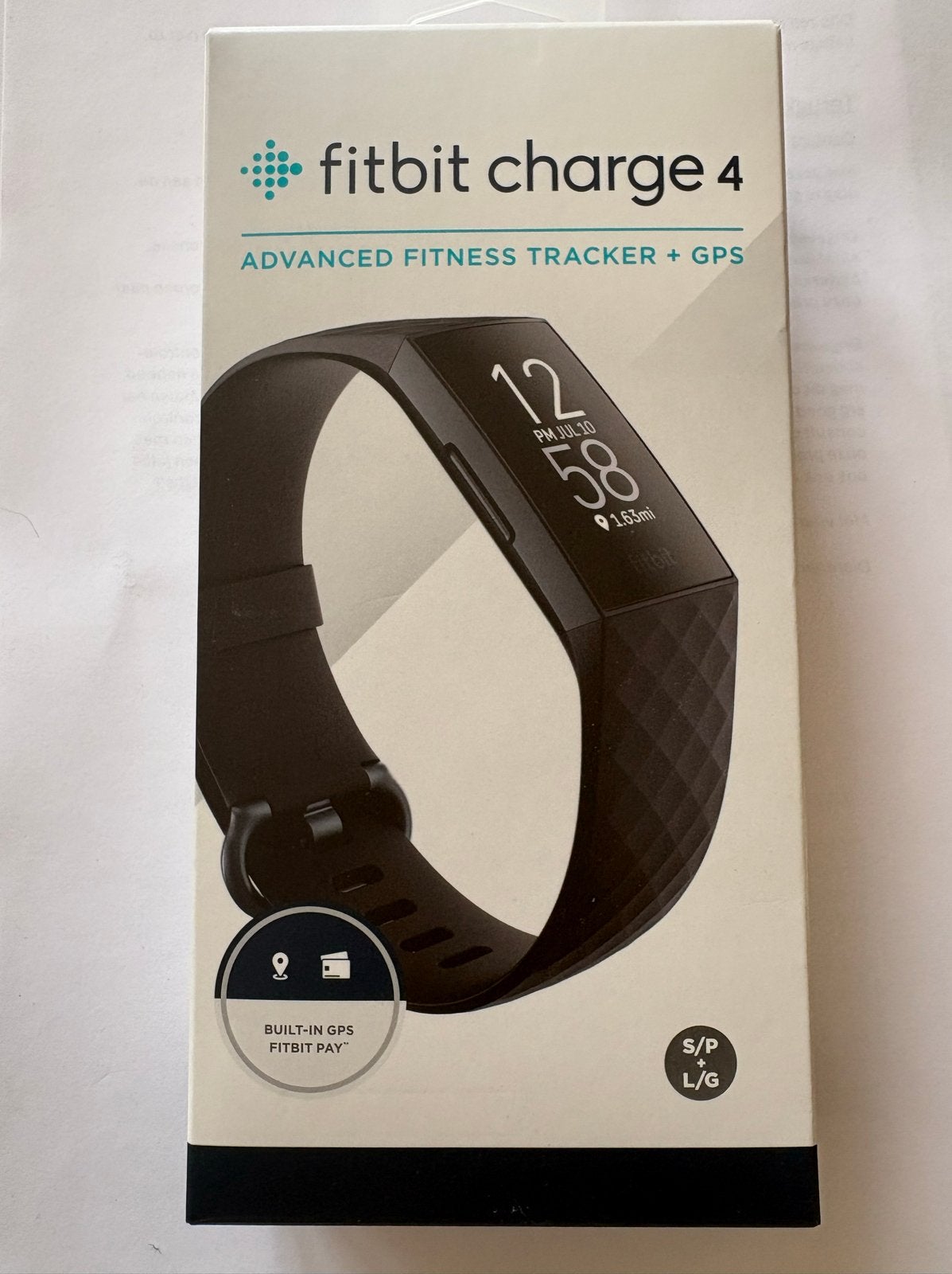 Fitbit Charge 4 Advanced Fitness Tracker + GPS, Ophalen, Zwart, Zo goed als nieuw, Waterdicht