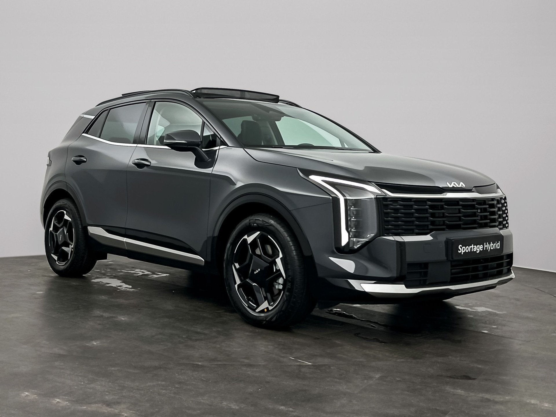 Kia Sportage 1.6 T-GDi Hybrid DynamicLine | elecktrische voo, Auto's, Zwart, 4 cilinders, Leder en Stof, Hybride Elektrisch/Benzine
