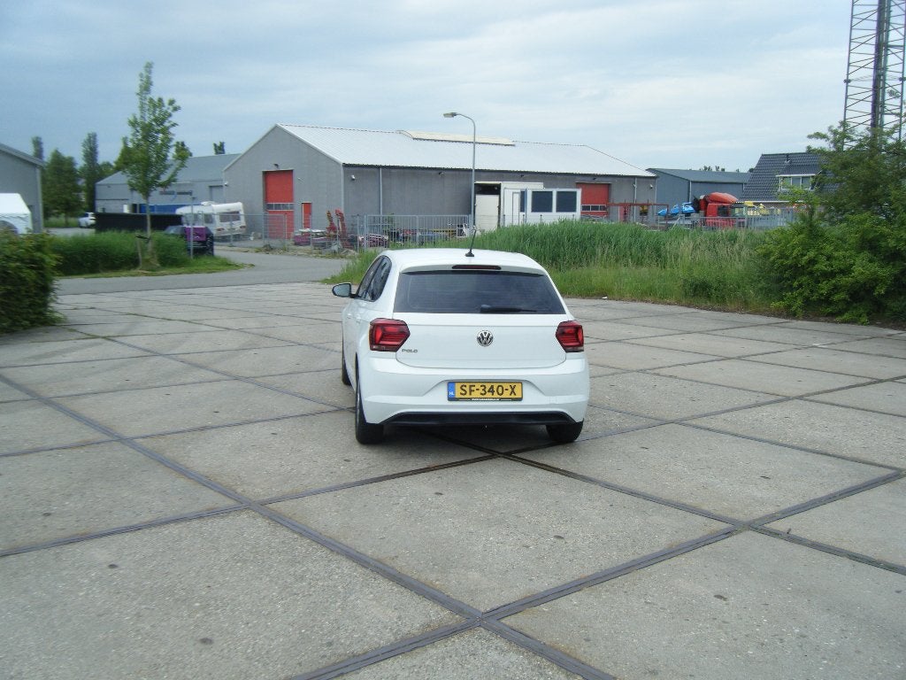 Volkswagen Polo 1.0 TSI Comfortline 70kW, Voorwielaandrijving, Stof, 40 €/maand, Zwart
