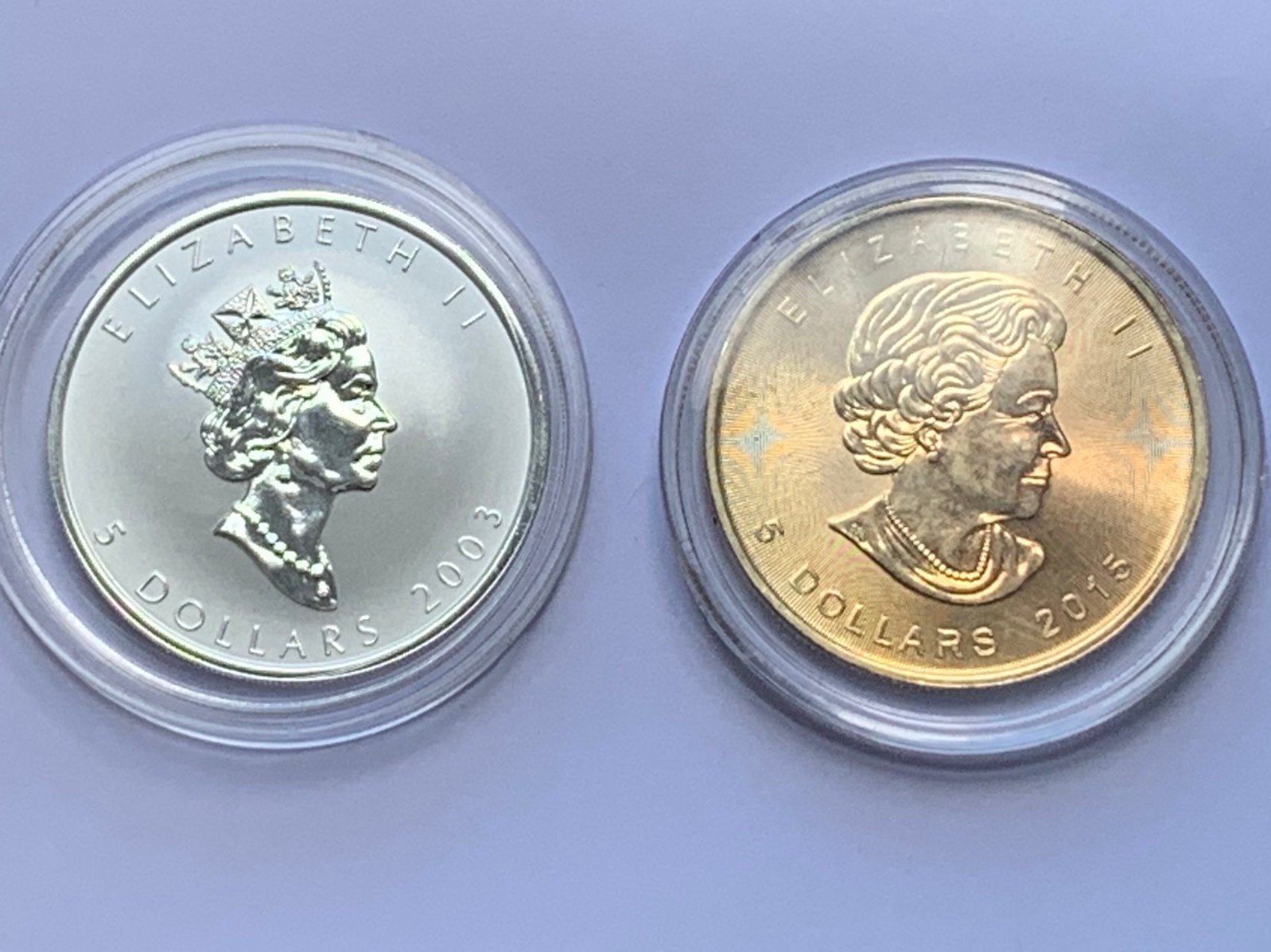 1 bijzondere maple leaf 1 oz de fluoriserende en 1 brons, Ophalen of Verzenden, Overige landen