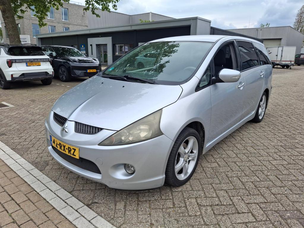 Mitsubishi Grandis 2.4  benzine Mivec 7 AUT 2005 Grijs, Auto's, Stof, Zwart, 7 stoelen, Bedrijf