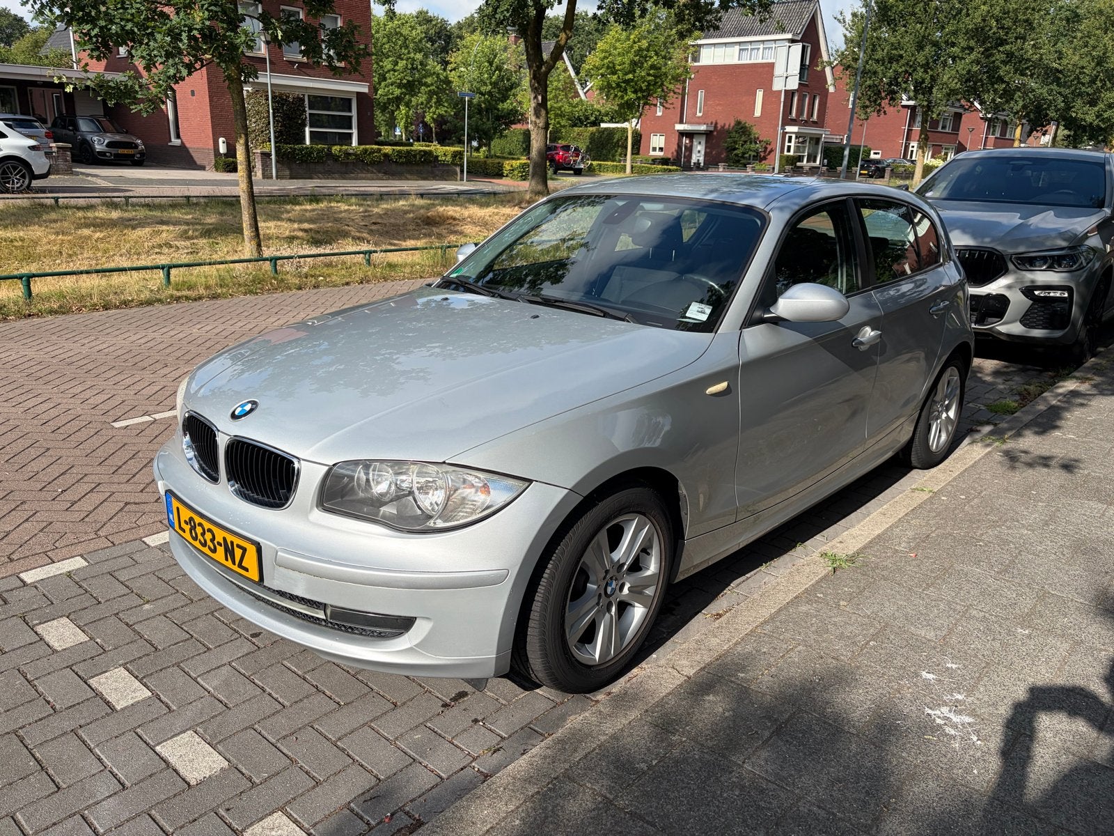 BMW 1-Serie 1.6 116I 5DR 2009 Grijs 76.000 km, Auto's, 1-Serie, Achterwielaandrijving, 1599 cc, 4 cilinders