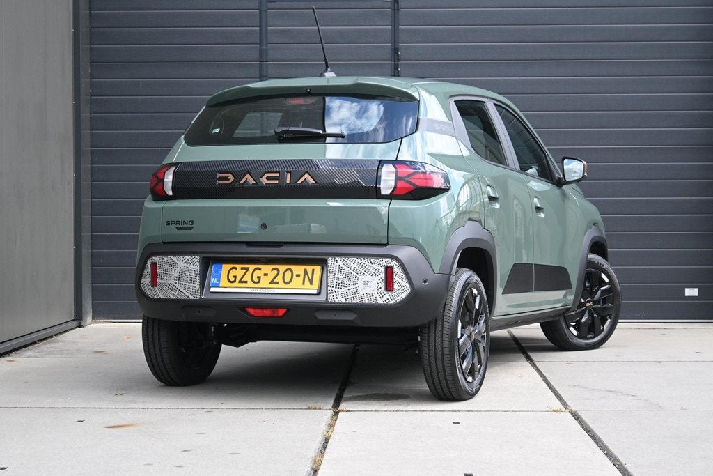 Dacia Spring Extreme 65 26.8 kWh | DC-LADER | CAMERA | NAVI, Gebruikt, 4 stoelen, Leder en Stof, Origineel Nederlands