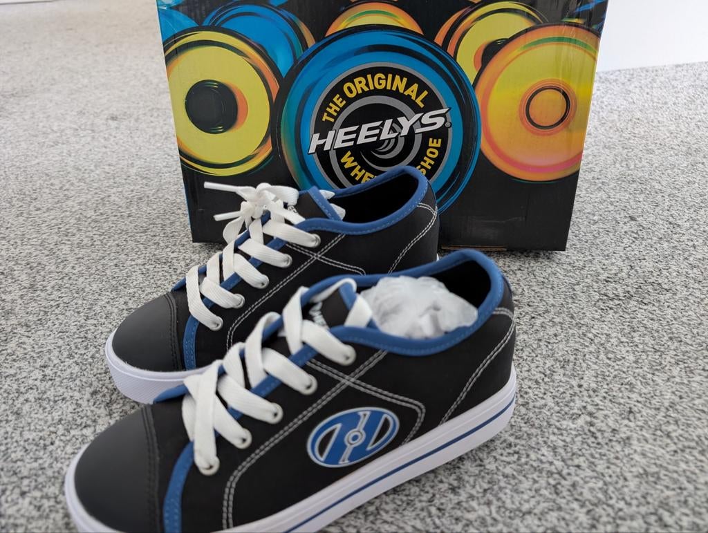Heelys rolschoenen zwart/blauw - Als goed as nieuw in doos, Ophalen of Verzenden, Verstelbaar, Nieuw, Kinderen