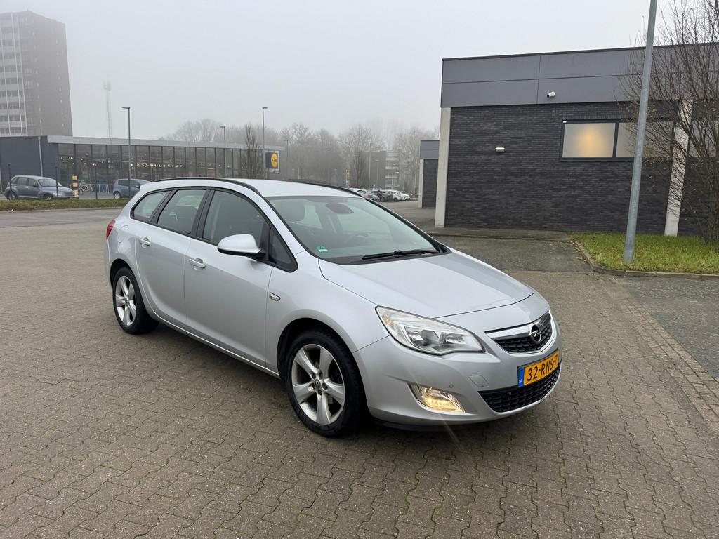 Opel Astra Sports Tourer 1.4 Turbo Edition, Voorwielaandrijving, Euro 5, Stof, Gebruikt
