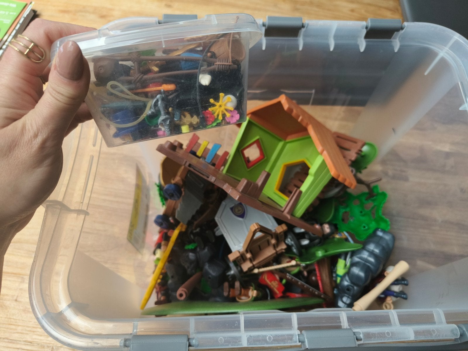 Playmobil doos vol., Ophalen