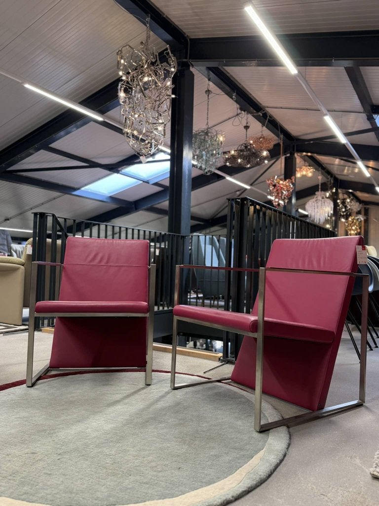 2 als nieuw Arco Spine Fauteuils roze leer design stoel