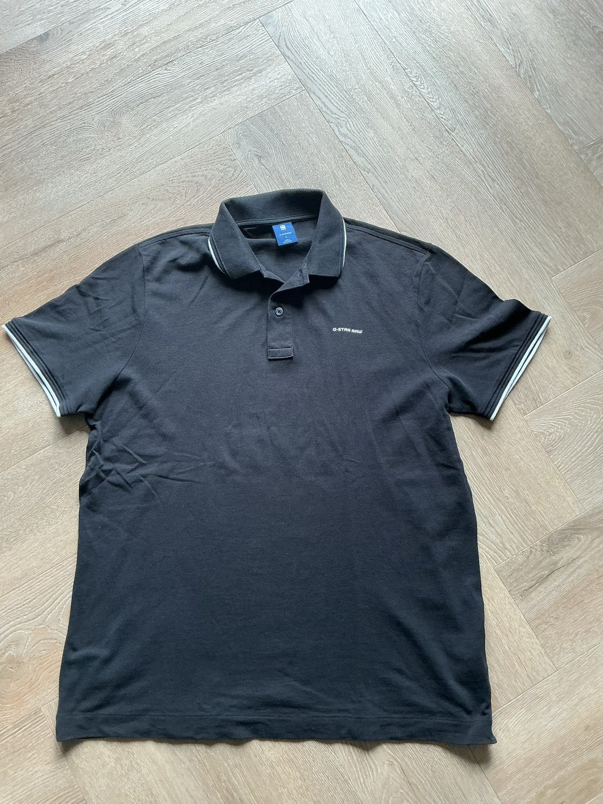 Zwart heren poloshirt van G-Star Raw maat L, Ophalen of Verzenden, Zo goed als nieuw
