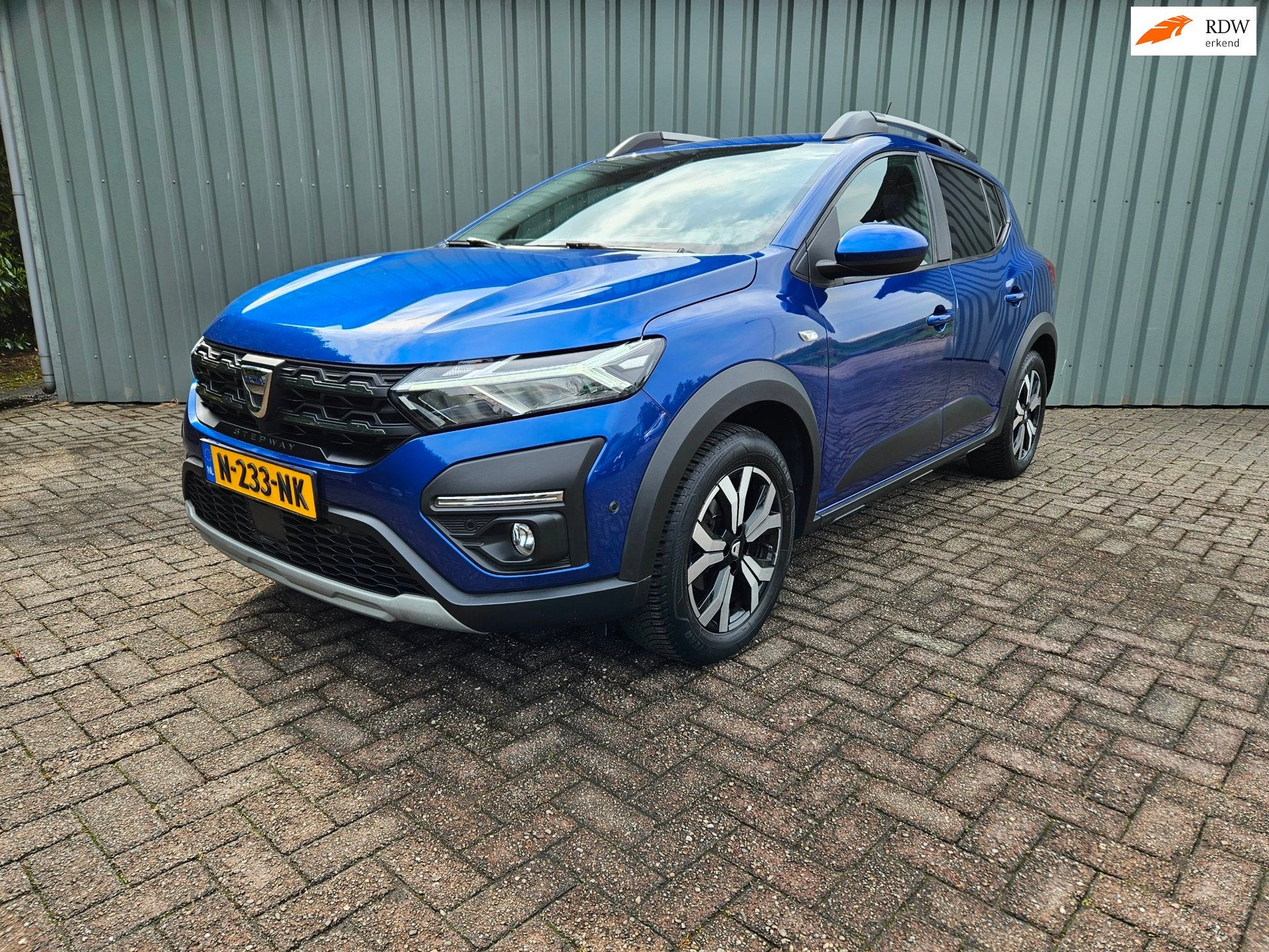 Dacia Sandero Stepway 1.0 TCe 90 Navi Clima Camera Trekhaak, Auto's, Blauw, Bedrijf, 19 km/l, 3 cilinders