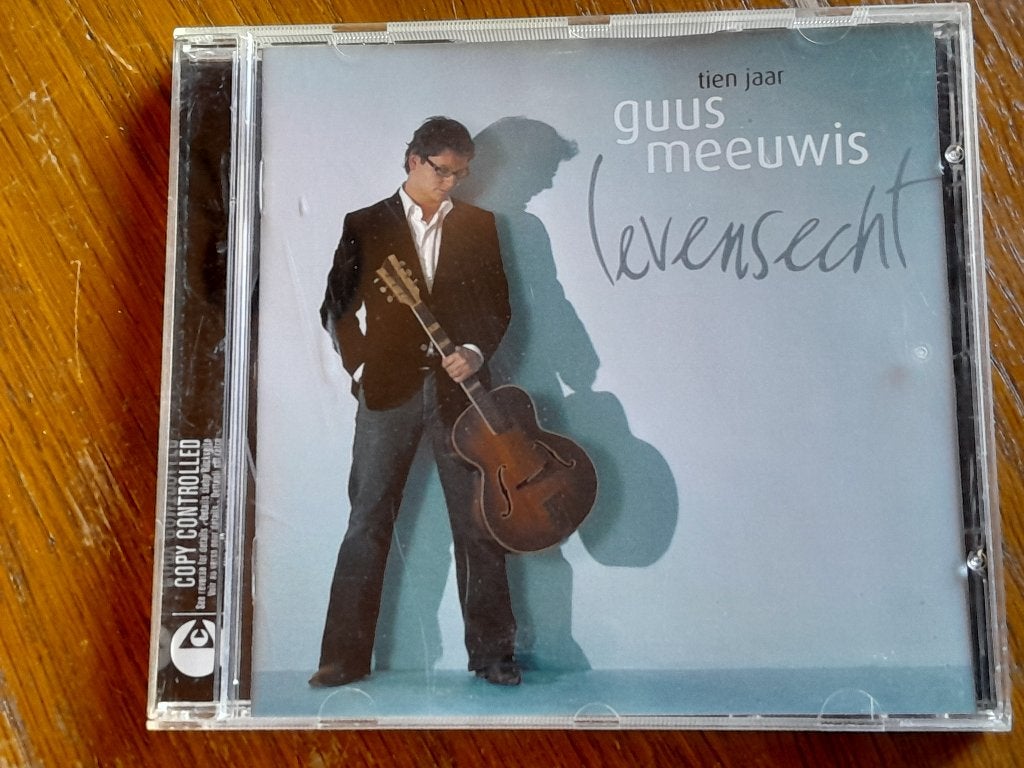Guus Meeuwis - Tien Jaar Levensecht CD, Ophalen of Verzenden, Zo goed als nieuw, Verzamelalbum, Pop
