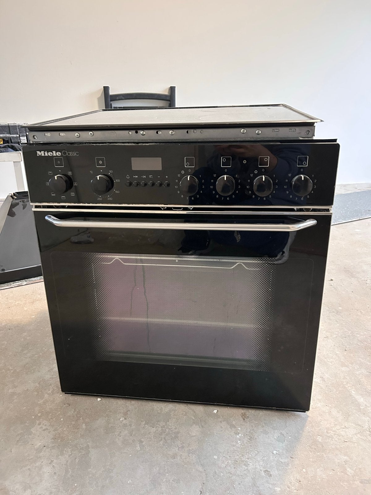 Miele kookplaat met oven - Netjes onderhouden, Ophalen, Gebruikt, Minder dan 85 cm, Keramisch