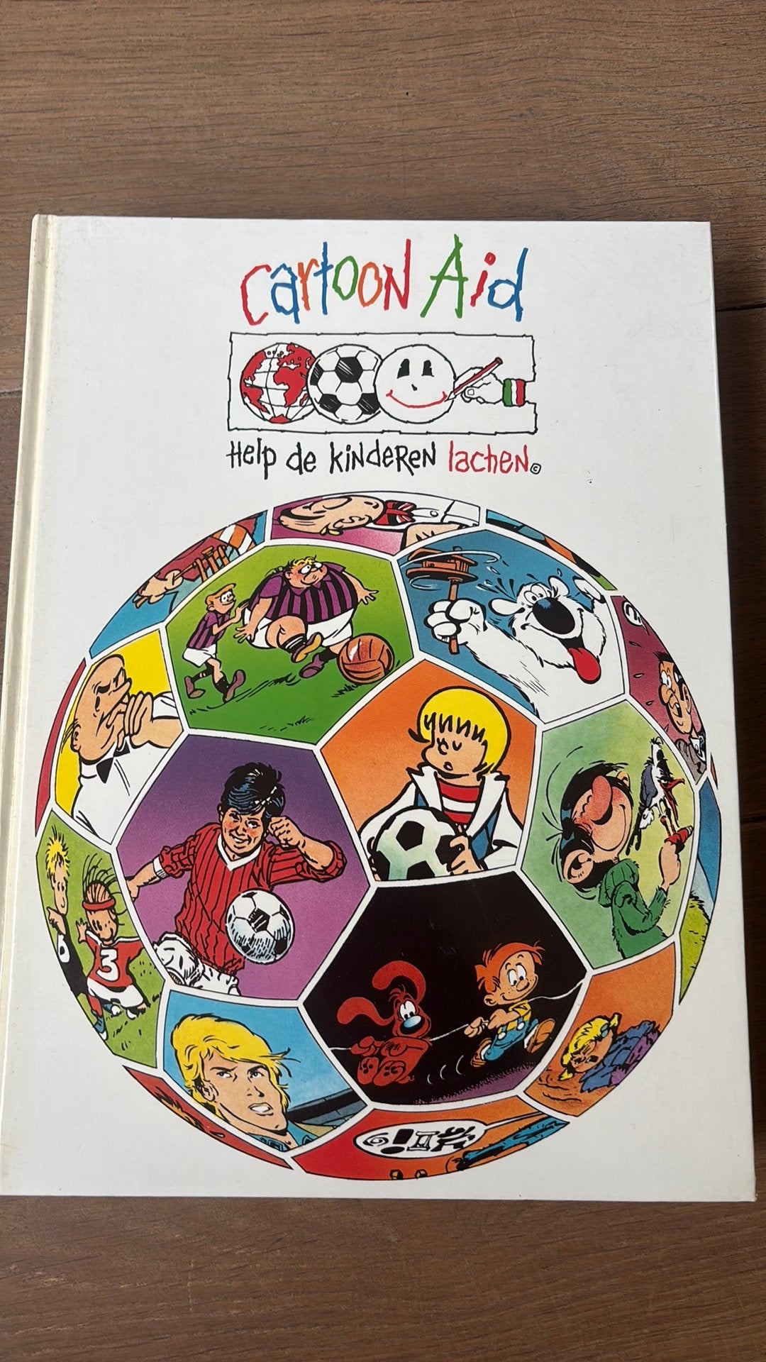 Cartoon aid, Boeken, Eén stripboek, Ophalen of Verzenden, Zo goed als nieuw