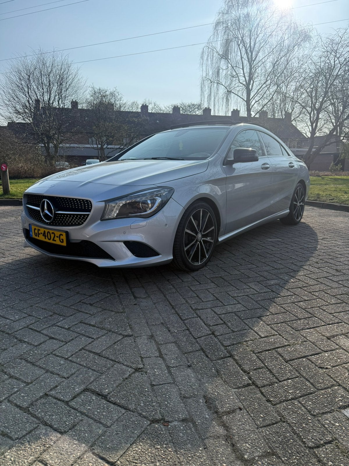 Mercedes-Benz CLA 180 1.6 90KW 7G-DCT (aut) 2015 Grijs, Auto's, 4 cilinders, 715 kg, 122 pk, 1200 kg